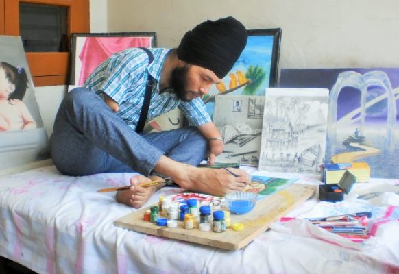 Jagwinder Singh with his art
